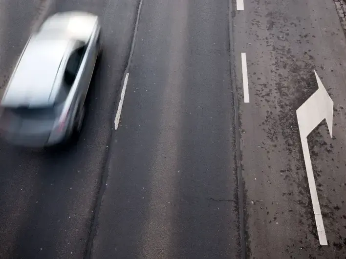 Queen Creek illegal left turn accident attorney reviewing intersection crash evidence near Queen Creek Marketplace