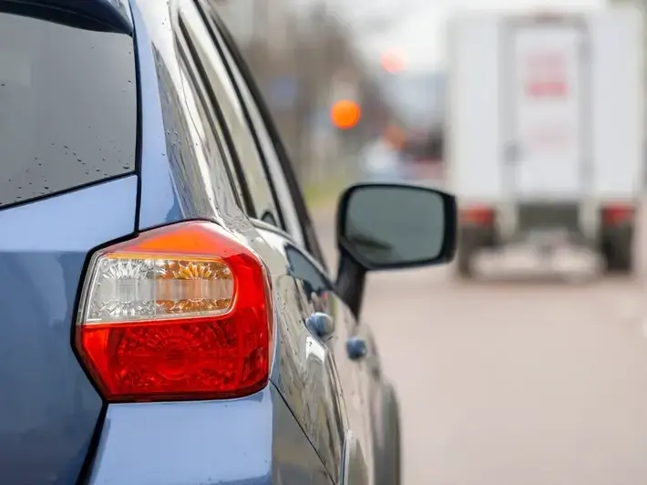 Investigator examining crash scene near Gilbert Riparian Preserve at Water Ranch